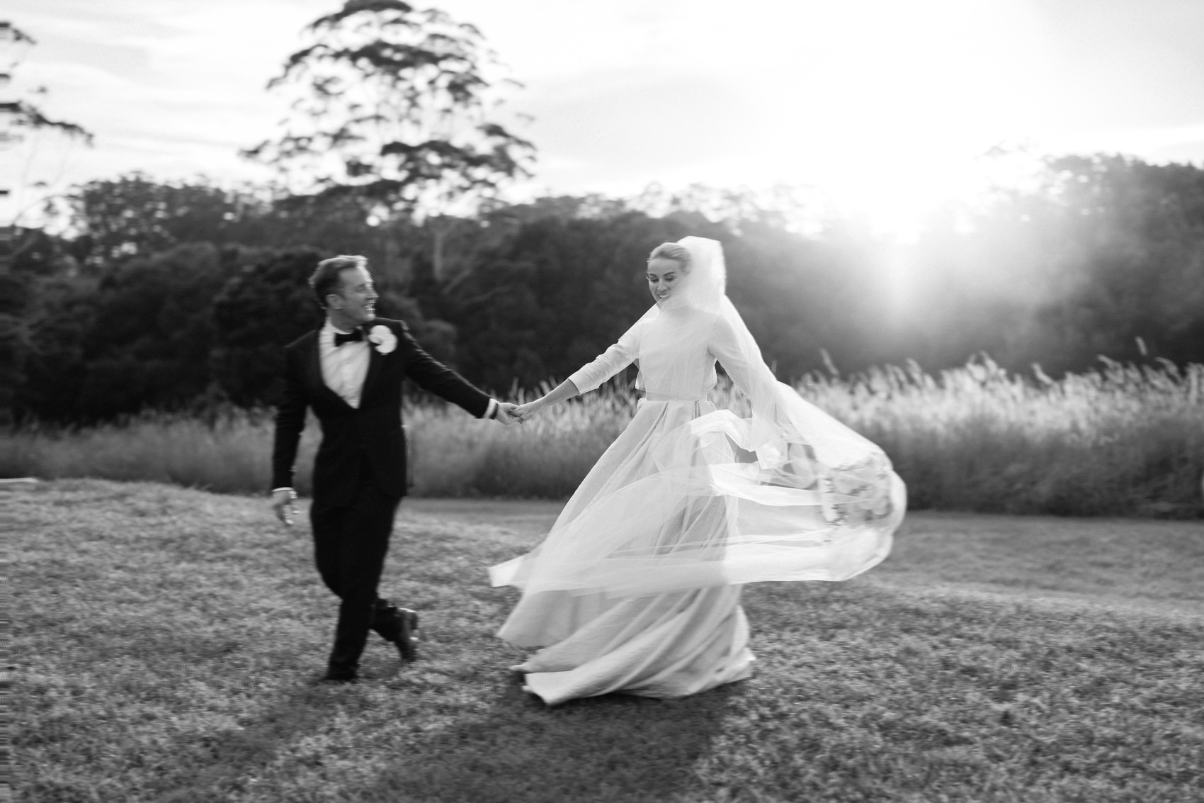 Bride and groom dancing at sunset at Deux Belettes Wedding