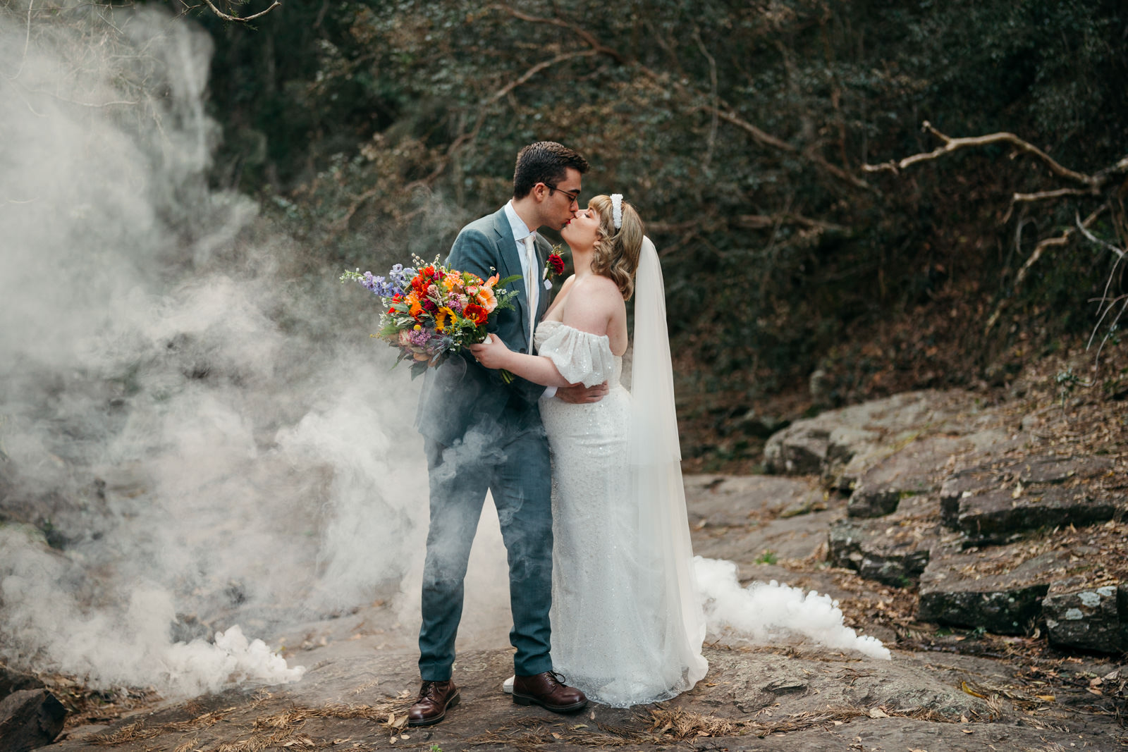 Smoke bomb used at micro wedding in a bush setting